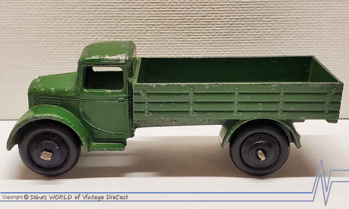 A Dinky Toys pre-war No. 22c motor truck, finished in turquoise with plated wheels and white tyres